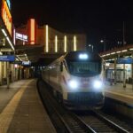 cinematic shot of a train leaving a glowing station - GraFixPrompt AI output